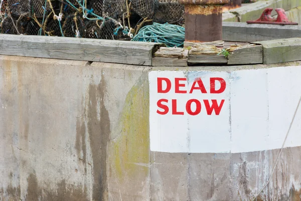 Harbour wall Dead Slow speed warning