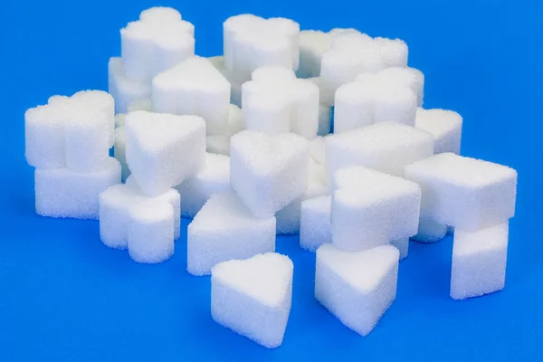 Sugar cubes in various forms