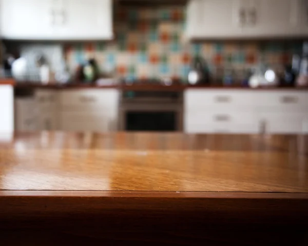 Blurred kitchen interior and napkin and desk space