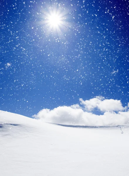 Background of cold winter landscape with snow, blue sky and sunl
