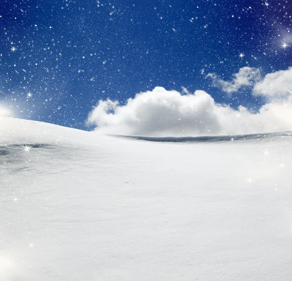 Background of cold winter landscape with snow, blue sky and sunl