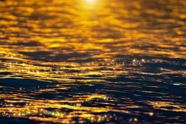 The water surface at the lake with light of sunset.