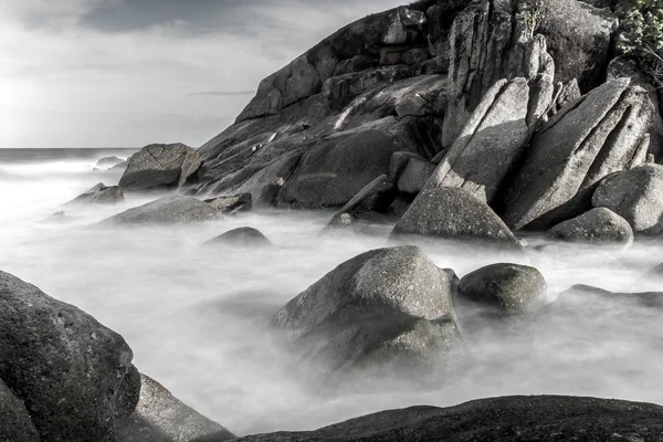 Black and white photo of the rocks at Songkhla, Thailand.