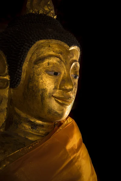 Old Buddha face in thai temple.