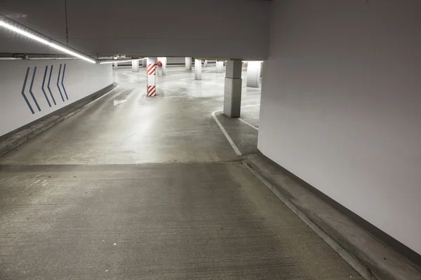 Empty driveway in concrete parking garage