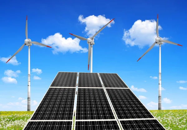 Solar energy panels and wind turbines.