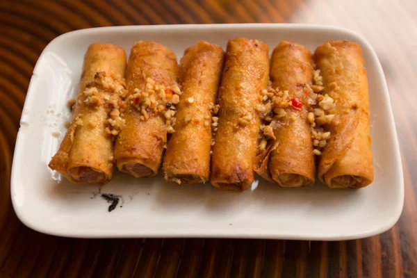 Fried spring rolls with peanut sauce