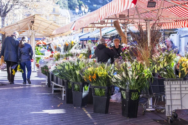 NICE, FRANCE, on JANUARY 13, 2016. Marche Du Cours Saleya. Market counter, plants and flowers
