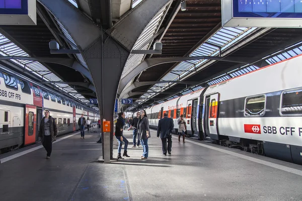 ZURICH, SWITZERLAND, on MARCH 26, 2016. Railway station. The modern high-speed train at the platform. Passengers go on the platform