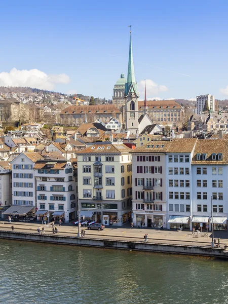 ZURICH, SWITZERLAND, on MARCH 26, 2016. Spring morning. A view of the city from the survey platform Lindenkhof. Architectural complex of the embankment