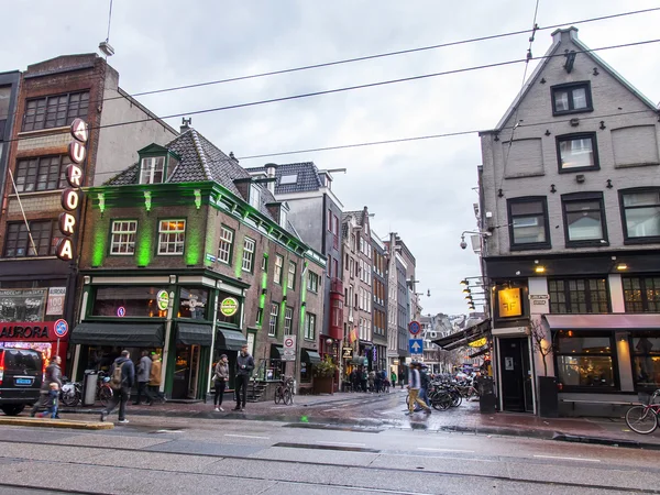 AMSTERDAM, NETHERLANDS on MARCH 27, 2016. Typical urban view in the spring evening