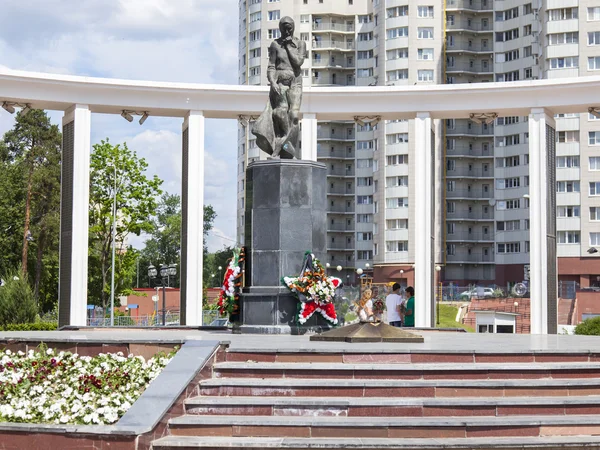 PUSHKINO, RUSSIA, on May 30, 2016. City landscape. View on multi-storey buildings and the Memorial in honor of the fallen soldiers