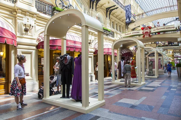 MOSCOW, RUSSIA, on May 31, 2016. Trade gallery of the GUM historical shop at Red Square. Exhibits of a scenic suit within a festival of arts the Cherry wood