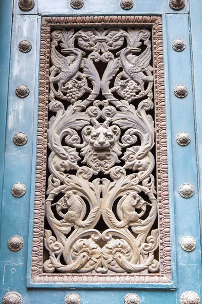 PARIS, FRANCE, on JULY 12, 2016. Typical architectural details of buildings around historical part of the city. Entrance door