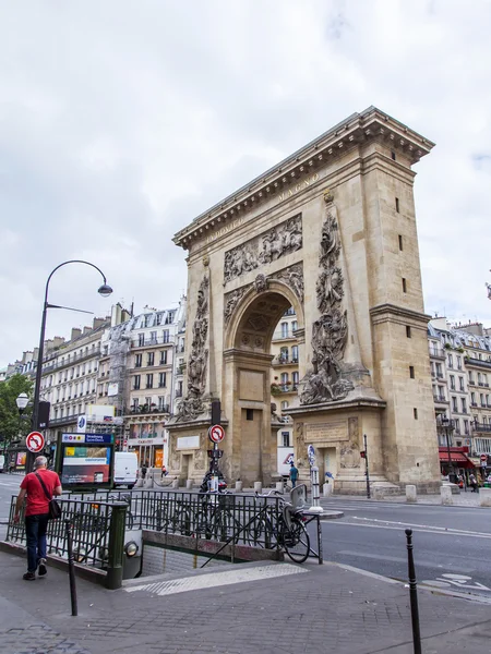 PARIS, FRANCE, on JULY 12, 2016. Typical urban view. Vorta Saint-Denis (La Porte Saint-Denis) - one of triumphal arches in the city