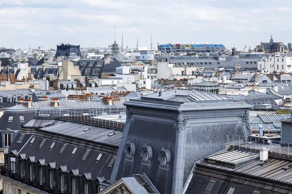 PARIS, FRANCE, on JULY 5, 2016. A typical urban view from the survey platform of the Gallery department store Lafayette. City roofs