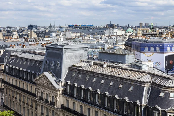 PARIS, FRANCE, on JULY 5, 2016. A typical urban view from the survey platform of the Gallery department store Lafayette. City roofs
