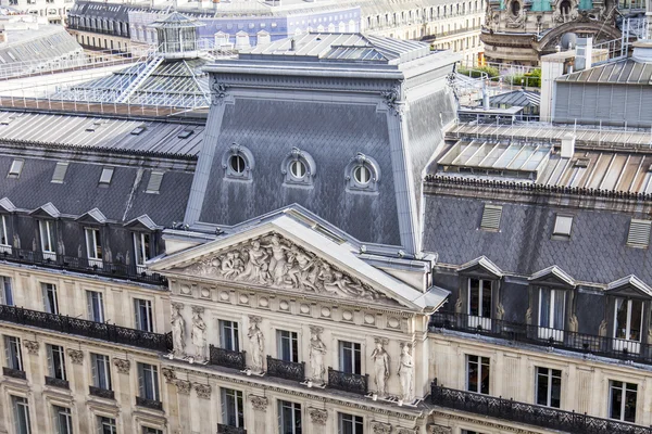 PARIS, FRANCE, on JULY 5, 2016. A typical urban view from the survey platform of the Gallery department store Lafayette. City roofs