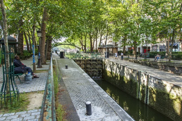 PARIS, FRANCE, on JULY 6, 2016. Locks and bridges on the canal Saint Martin (fr. canal Saint-Martin)