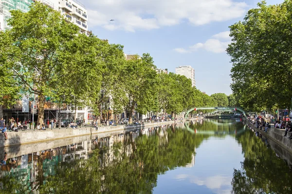 PARIS, FRANCE, on JULY 6, 2016. Saint Martin channel (fr. canal Saint-Martin). Embankments and their reflection in water