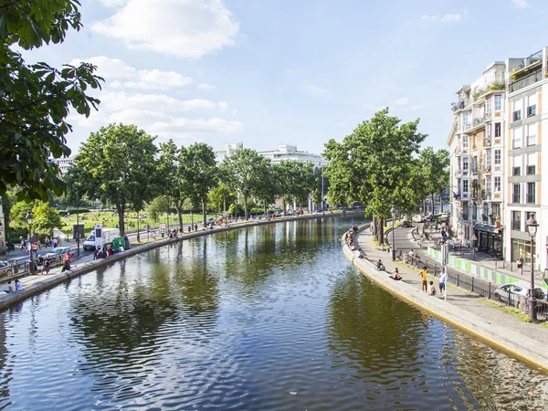 PARIS, FRANCE, on JULY 6, 2016. Saint Martin channel (fr. canal Saint-Martin). Embankments and their reflection in water