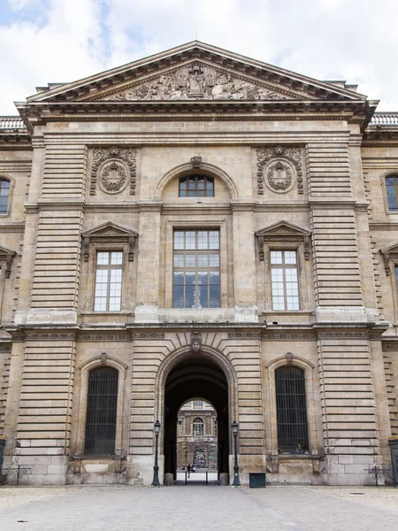 PARIS, FRANCE, on JULY 11, 2016. Architectural fragment of one of facades of the museum Louvre (fr. Musee du Louvre). This building - the ancient royal palace (Palais du Louvre)