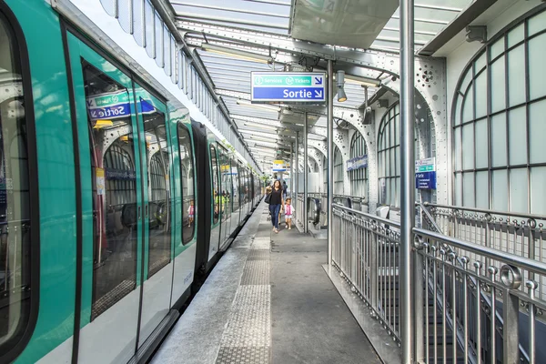 PARIS, FRANCE, on JULY 8, 2016. Passengers wait for the train not to a platform in the subway