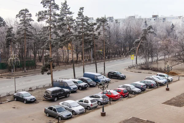 Pushkino, Russia, on November 30, 2014. early frosty morning at the end of fall. A view of a parking in the inhabited massif