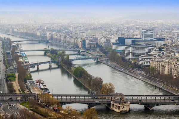 Paris, France, on March 27, 2011. A view from a survey platform on the Eiffel Tower to Seine and its embankments and bridges