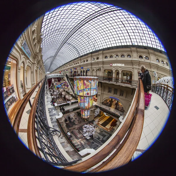 Moscow, Russia, on January 20, 2014. Complete circular fisheye view of the trading floor of GUM shop. The GUM is historical sight of Moscow and the recognized center of shopping