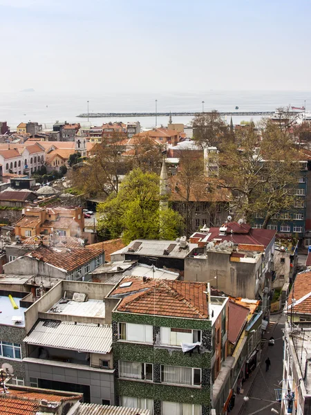 Istanbul, Turkey. April 28, 2011. A view of houses on the bank of the Bosphorus. Urban roofs.