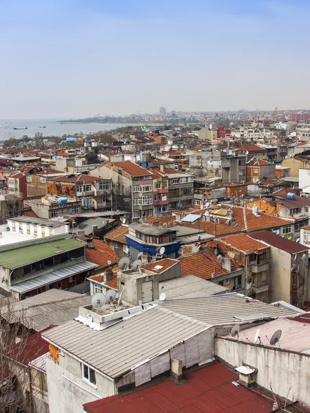 Istanbul, Turkey. April 28, 2011. A view of houses on the bank of the Bosphorus. Urban roofs.