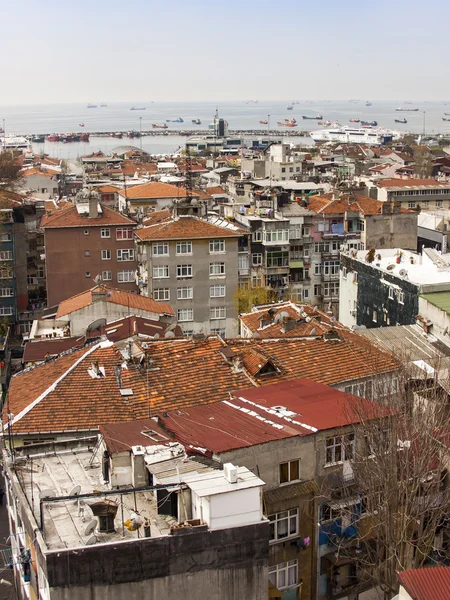 Istanbul, Turkey. April 28, 2011. A view of houses on the bank of the Bosphorus. Urban roofs.