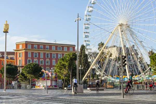 Nice, France, on March 7, 2015. A festive attraction a big wheel on Massen Square