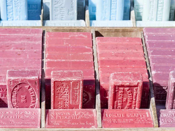 Nice, France, on March 10, 2015. Natural soap - a typical souvenir from Provence - lies on a counter of local shop