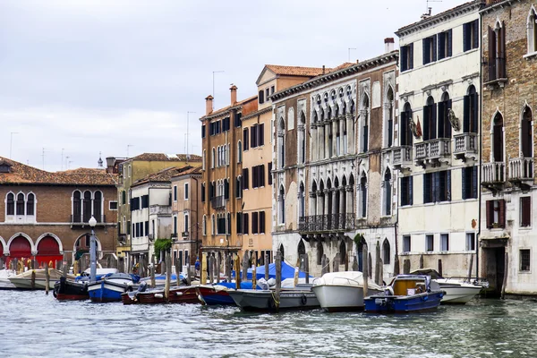 VENICE, ITALY - on APRIL 30, 2015. Old houses ashore Grand channel (Canal Grande). The grand channel is the main transport artery of Venice and its most known channel
