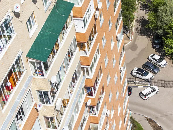 Pushkino, Russia, on May 26, 2015. Fragment of a facade of a new apartment house, top view