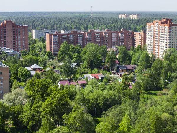 PUSHKINO, RUSSIA - on MAY 7, 2015. New multystoried houses on the river bank of Serebryank