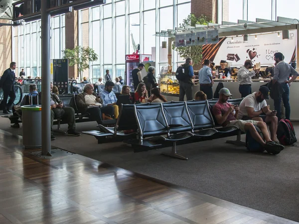 VENICE, ITALY, on MAY 5, 2015. Marco Polo's airport, hall of departures. Passengers expect the announcement of the beginning a boarding into the plane