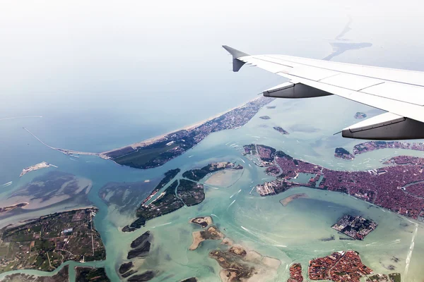 The top view from a plane window on islands of the Venetian lagoon