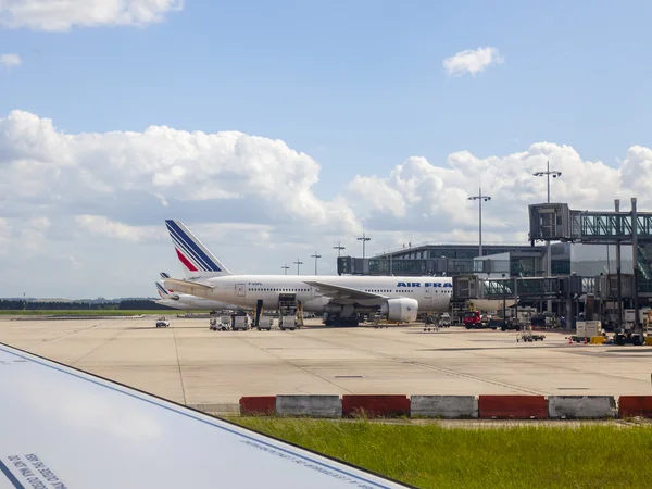 PARIS, FRANCE - on MAY 5, 2015. International airport Charles de Gaulle. A view from the window of the flying-up plane on land services