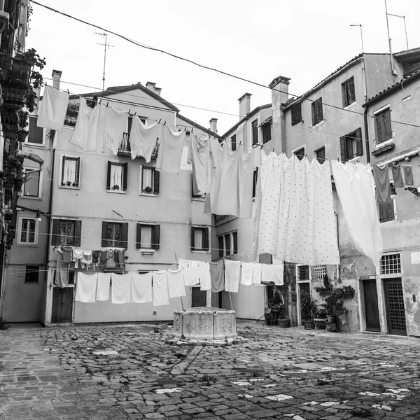 VENICE, ITALY - on MAY 3, 2015. Typical city yard. The linen dries on ropes