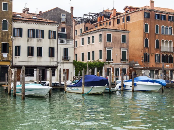 VENICE, ITALY - on MAY 4, 2015. City landscape. An architectural complex of buildings on the bank of the Grand channel (Canal Grande). Boats near the coast