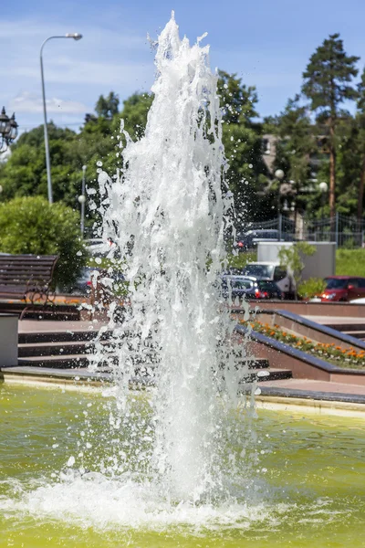 PUSHKINO, RUSSIA - on JUNE 1, 2015. City landscape in the sunny summer day. The fountain, fragment