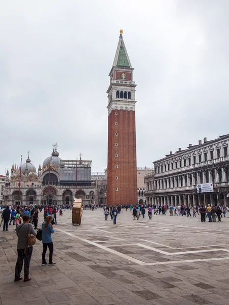 VENICE, ITALY - on MAY 4, 2015. Tourists walk on San-Marko Square - the main city square