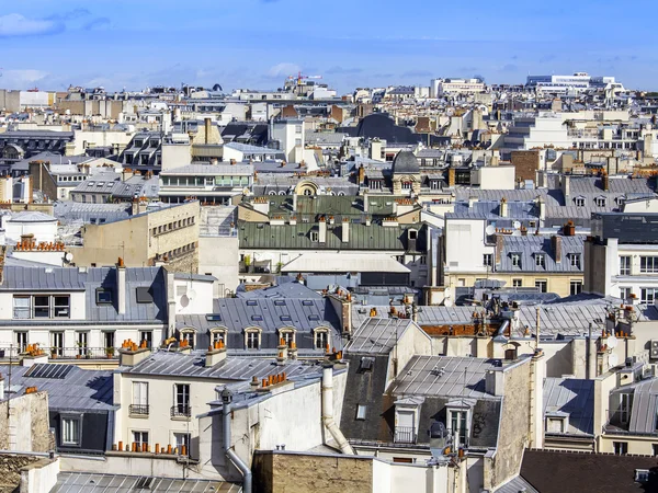 PARIS, FRANCE, on AUGUST 26, 2015. The top view from a survey platform on roofs of buildings in historical part of the city