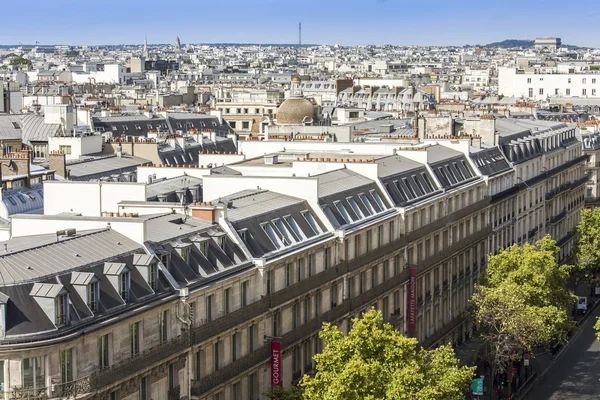 PARIS, FRANCE, on AUGUST 26, 2015. The top view from a survey platform on roofs of buildings in historical part of the city