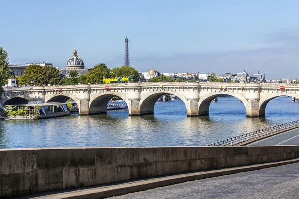 PARIS, FRANCE, on AUGUST 29, 2015. Novy Bridge (fr. Pont Neuf) - the oldest of the remained bridges of Paris through the river Seine