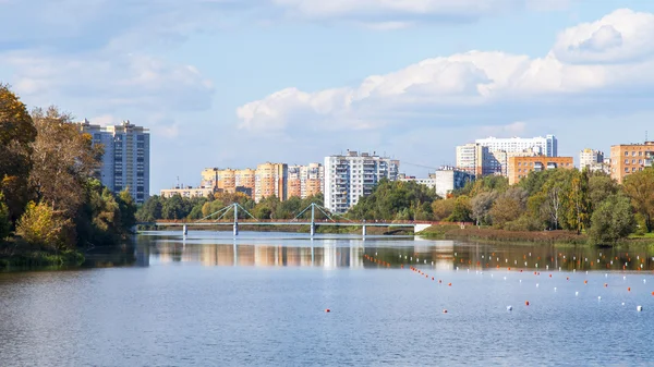 PUSHKINO, RUSSIA - on SEPTEMBER 27. New multystoried houses on the river bank of Serebryank