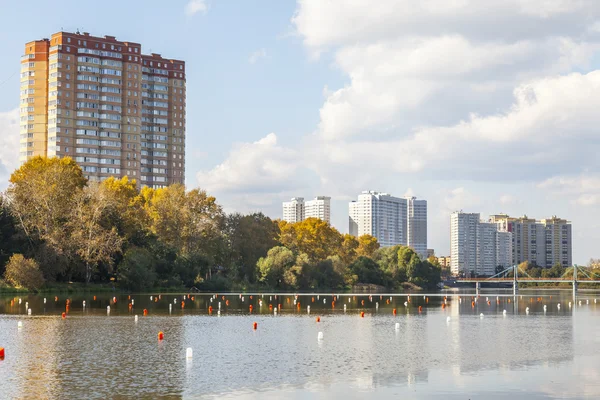 PUSHKINO, RUSSIA - on SEPTEMBER 27. New multystoried houses on the river bank of Serebryank